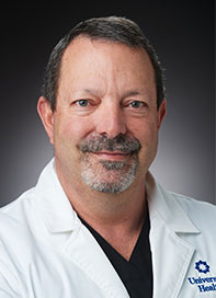 Headshot of Calvin Plummer, AGACNP