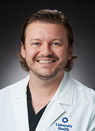 Headshot of Grzegorz Puchala, DO