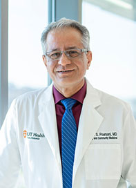 Headshot of Ramin Poursani, MD