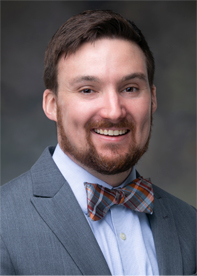 Headshot of Tyler Hughes, MD